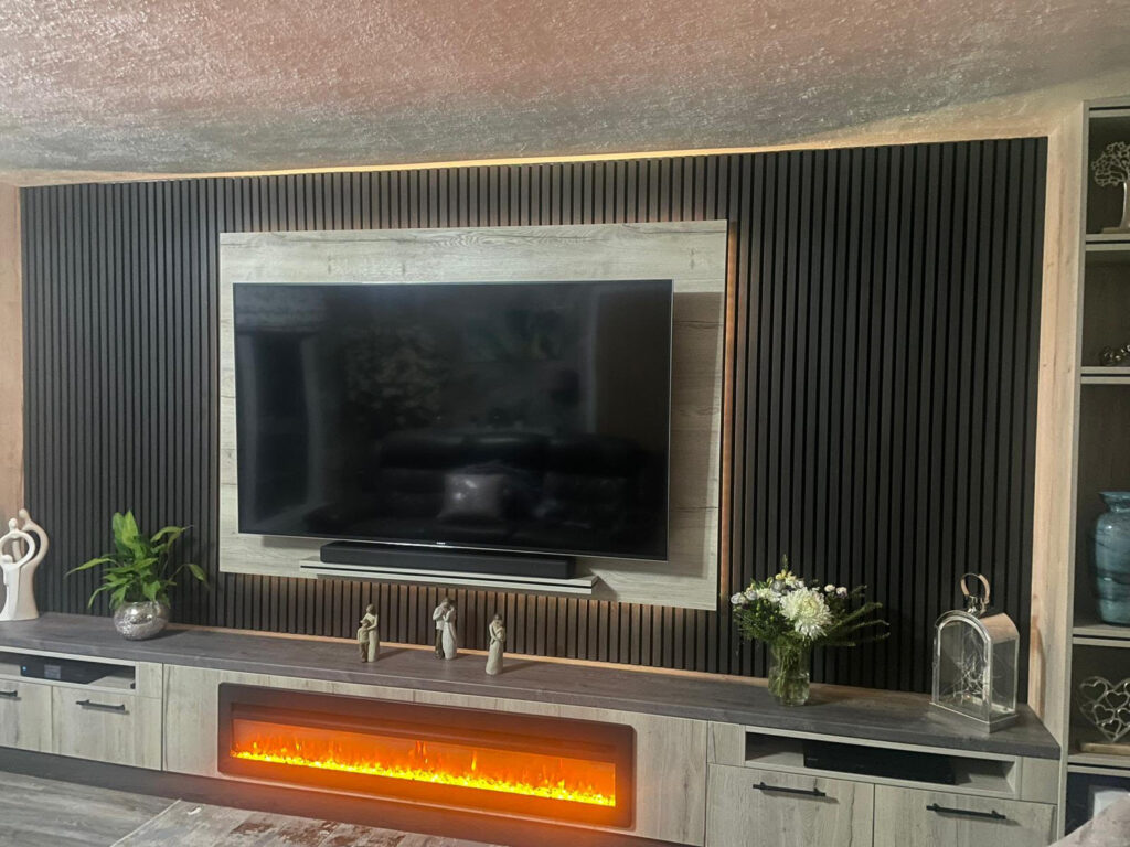 Bespoke media wall designed and manufactured by Adam Kristian